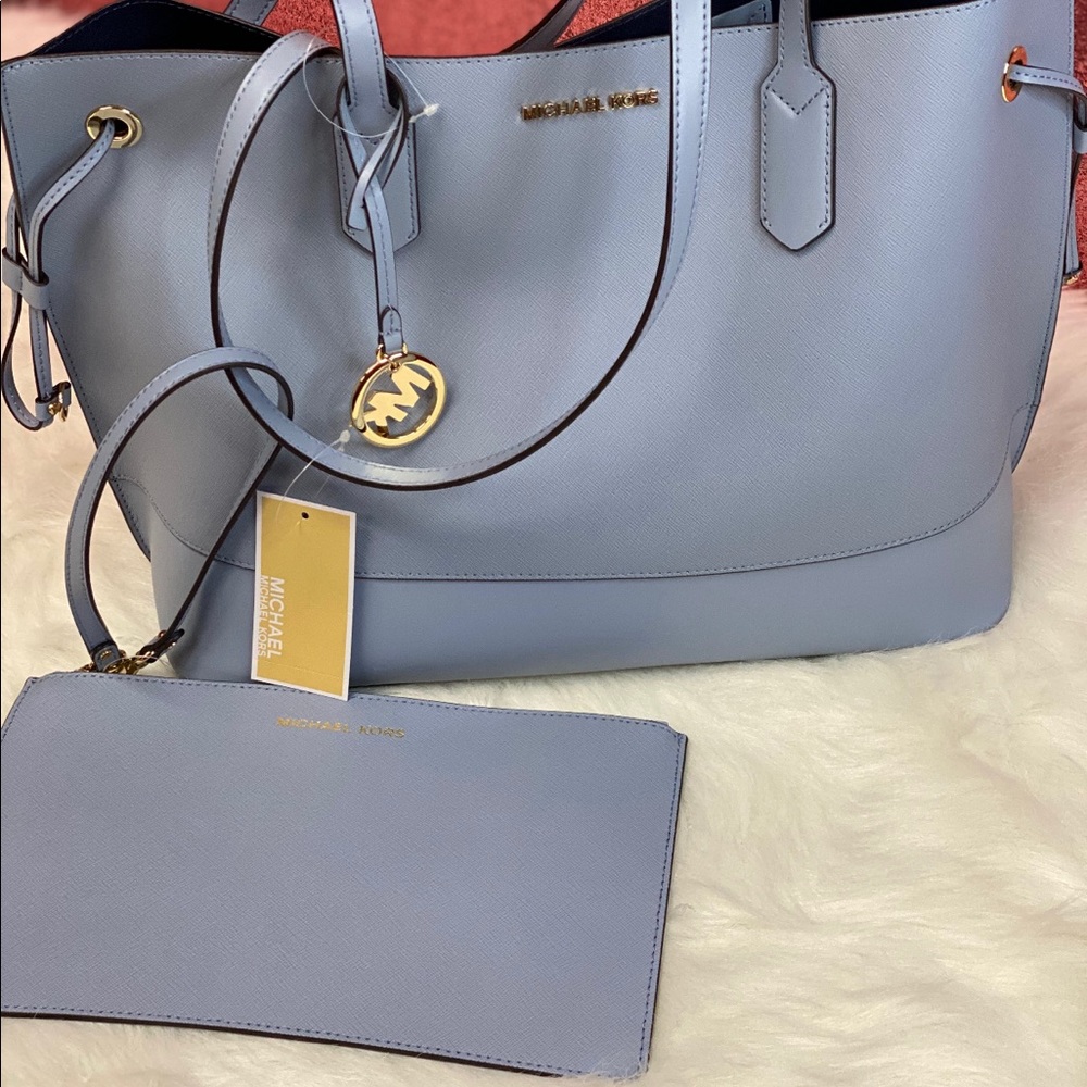 A Michael Kors blue purse with wallet (Atlantic)